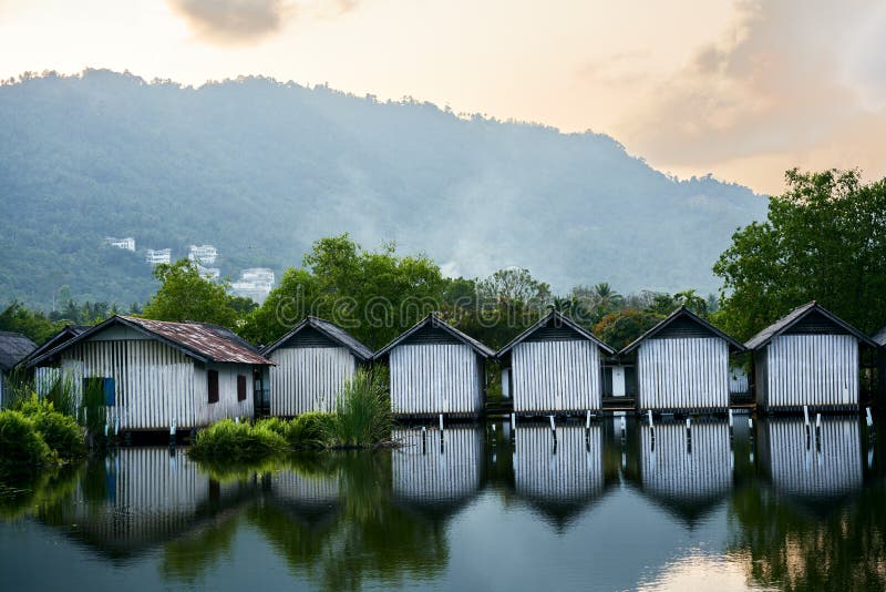 Row of houses on the river stock photo. Image of dwelling 151412772