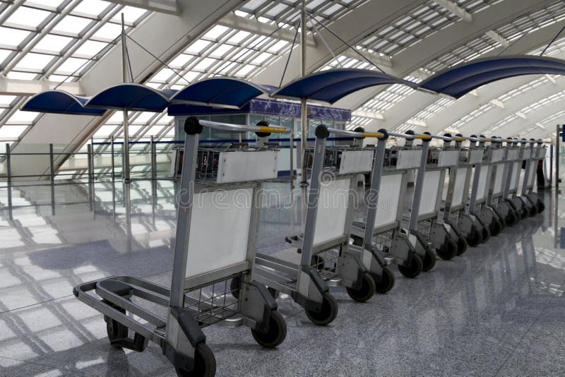 Row of Luggage Carts in the Airport Stock Image Image of empty