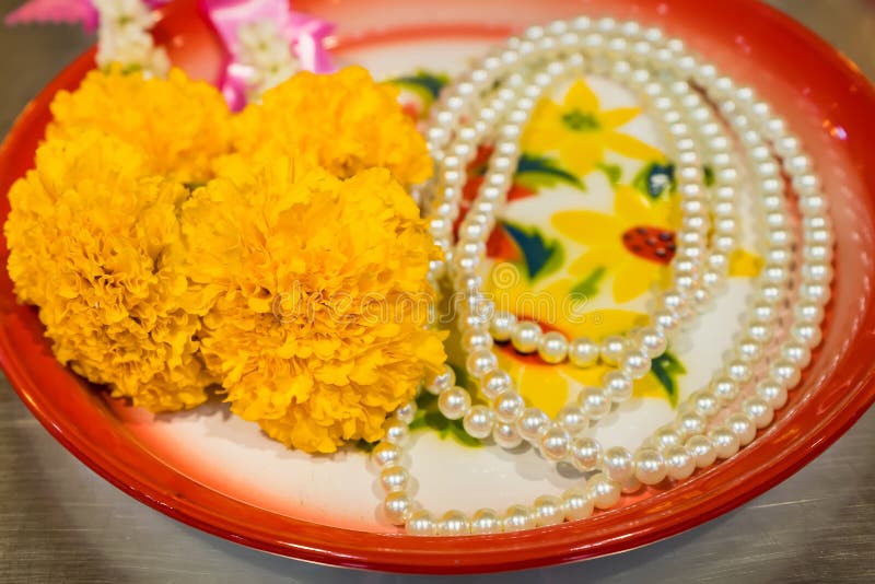 A Row of Marigold Flower Garlands Which are Used Traditionally in