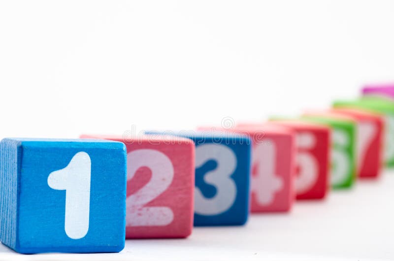 Row numbers on colorful wooden blocks stock photography