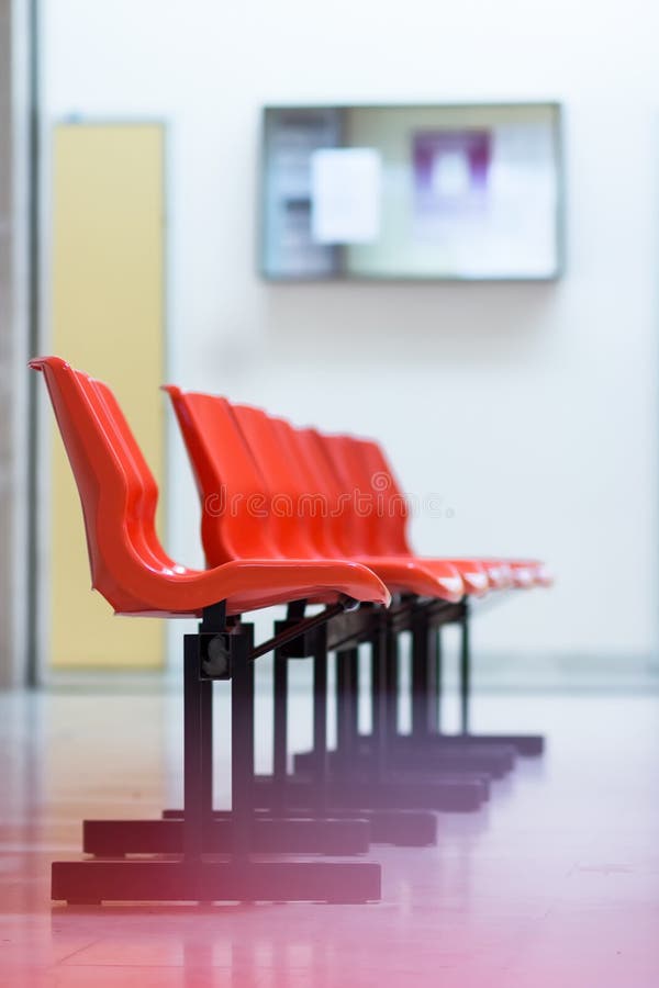 Row of Red Plastic Chairs in Hospital Stock Image Image of simplicity