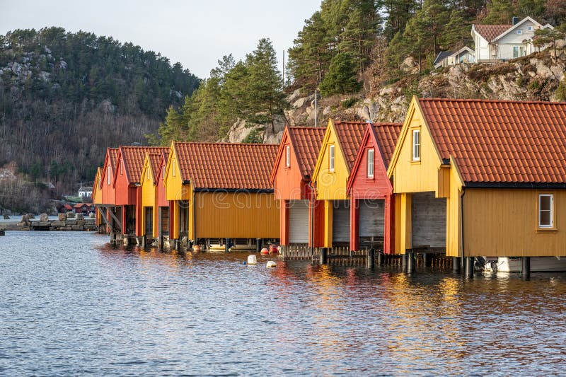 Row of red and yellow boat houses.. royalty free stock photo