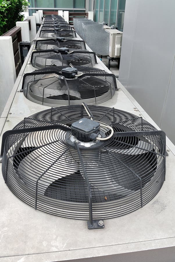 Air Conditioner Compressor Installed in Old Building. Outdoor Split