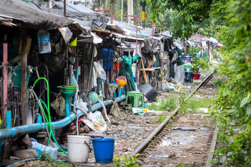 Row of shacks with small businesses beside the tracks of a train in central Bangkok in Thailand. royalty free stock photo Row of shacks with small businesses beside the tracks of a train in central Bangkok in Thailand. royalty free stock photo