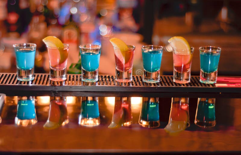 Row of shots on the bar stock image. Image of disco, alcoholism 16396907