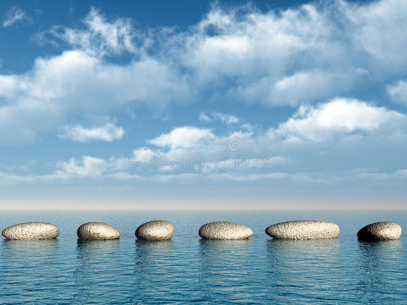 Una fila di pietre in acqua.