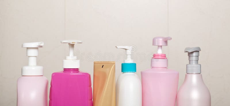 Row of toiletry bottles