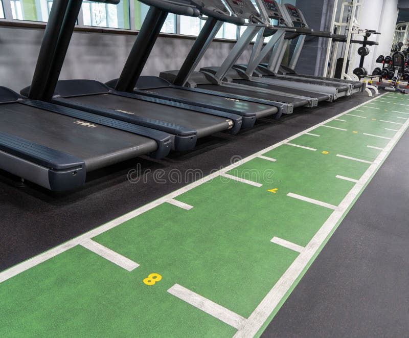 Row of Treadmills in the Sports Complex. Stock Photo Image of modern