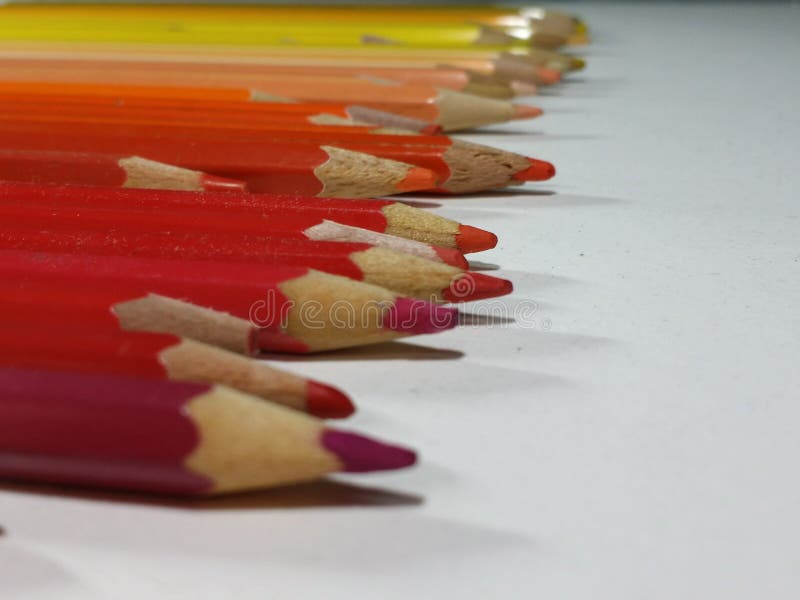 Row Of Warm Tone Colored Pencils 9 royalty free stock photos