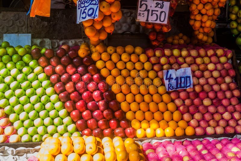 Rows of Apples and Oranges at a Market in Colombo, Sri Lan Stock Image