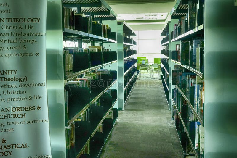 Rows of book racks in library stock photo