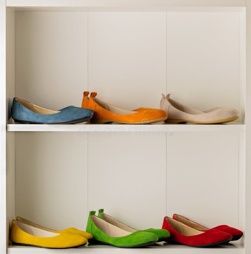 Rows of Colorful Women`s Shoes Ballet Shoes in the Wardrobe. Stock ...