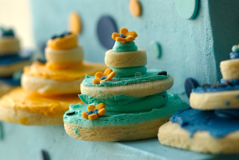 Rows of delicately decorated gourmet cookies