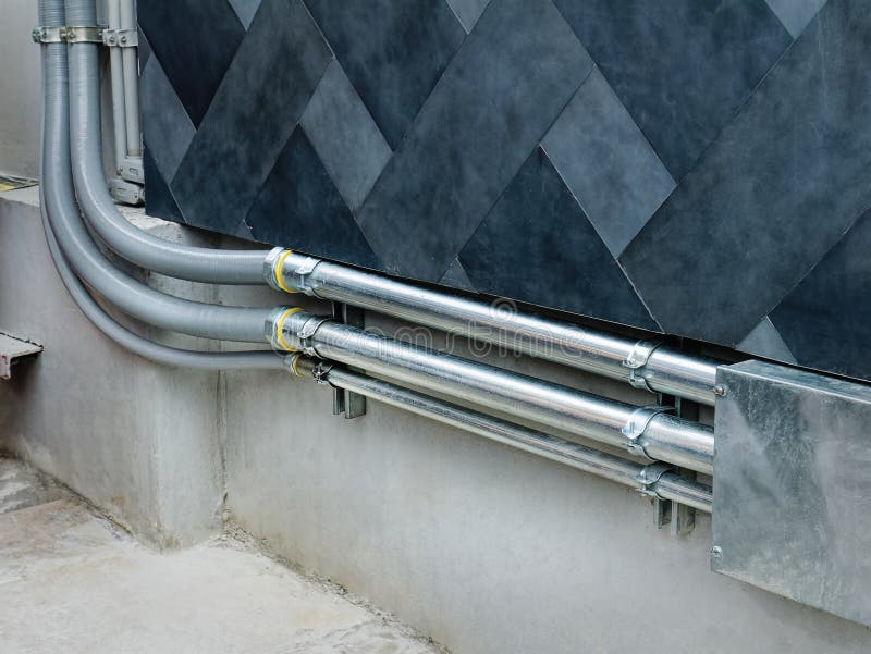 Rows of Electrical Cable Piping Along the Wall Stock Photo Image of