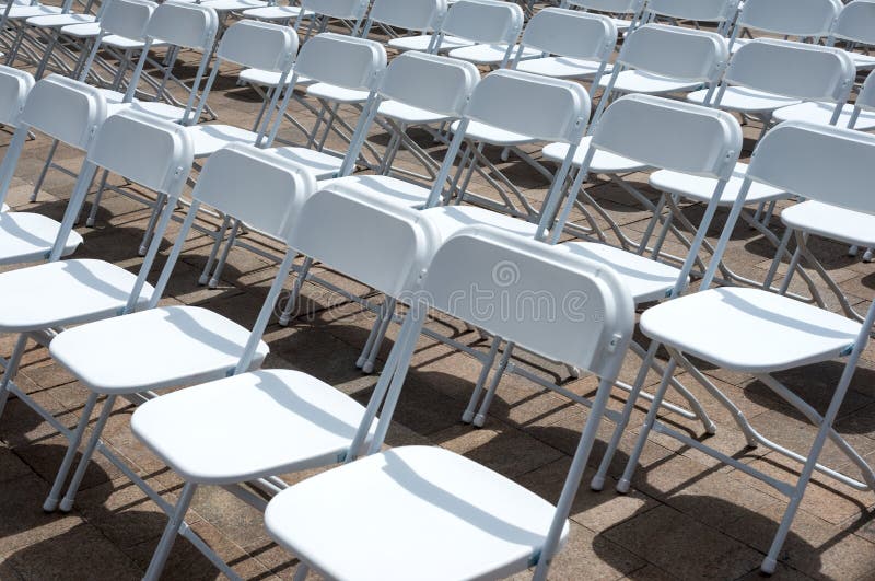 Rows of folding chairs. Room, furniture.