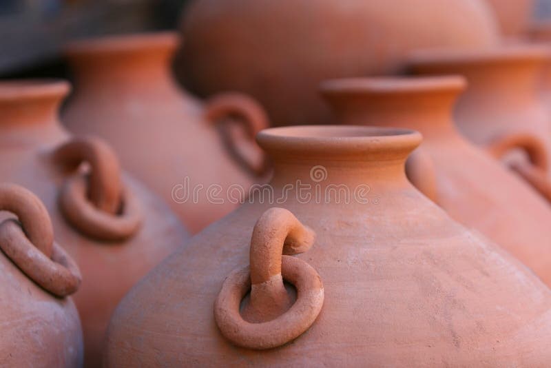 Rows of red clay pottery royalty free stock photography