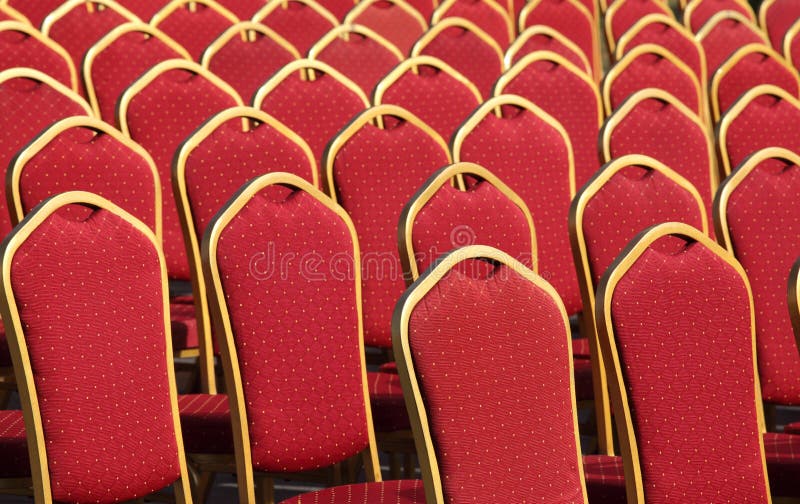 Arrangement of red chairs stock image. Image of pattern 3480945