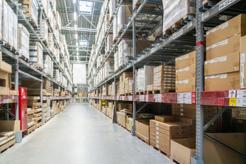 Rows of Shelves with Boxes in Modern Warehouse Editorial Stock Image