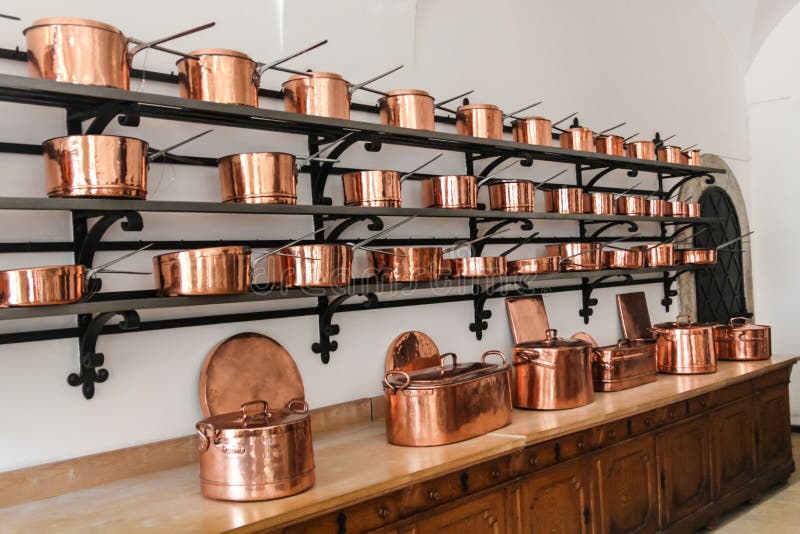 Rows of shiny copper saucepans in the Neuschwanstein castle in Bavaria. Neuschwanstein castle kitchen stock images, royalty-free photos and pictures