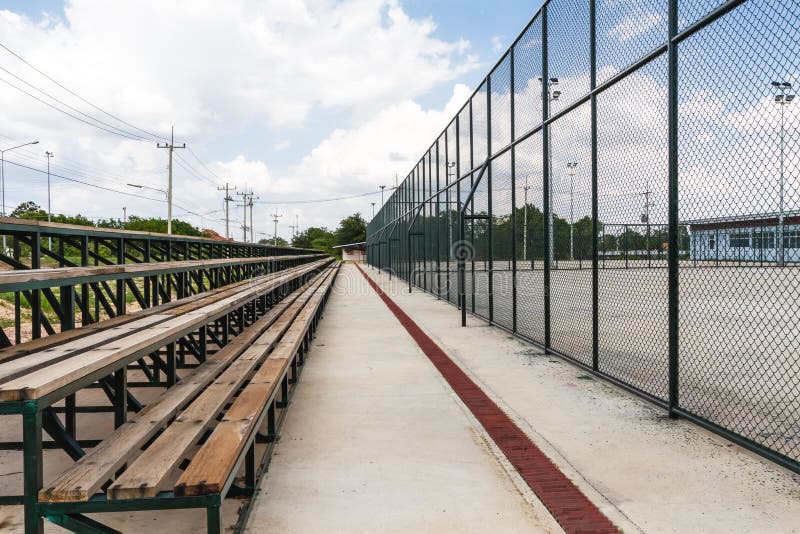 Rows of wooden grandstand empty seats of tennis field stock photography Rows of wooden grandstand empty seats of tennis field stock photography