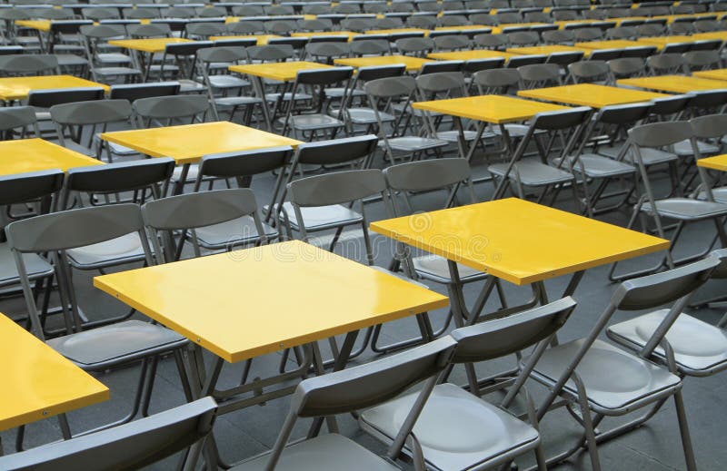 Rows of Yellow Metal Tables Stock Image Image of yellow, vacant 75048081
