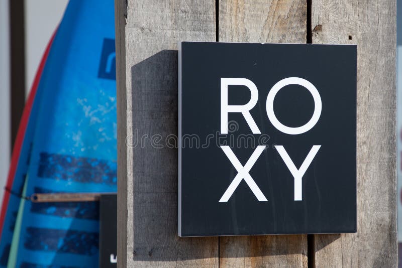 Bordeaux , Aquitaine France - 12 02 2023 : roxy shop text logo and brand sign on entrance wall wooden facade fashion girls surf store. Bordeaux , Aquitaine France - 12 02 2023 : roxy shop text logo and brand sign on entrance wall wooden facade fashion girls surf store