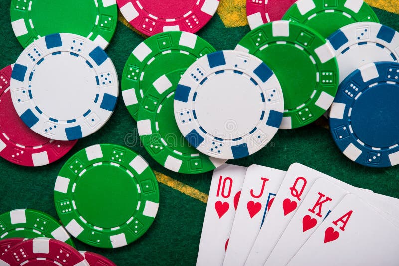 royal flash on cards and poker chips. Group, closeup.