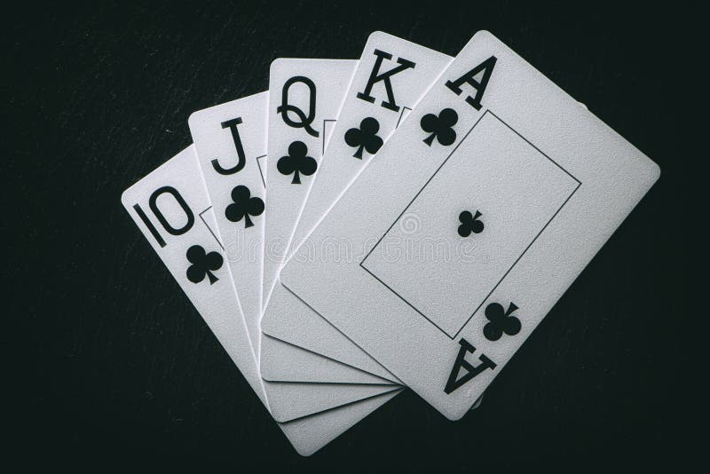 Royal Flush on a black background, a very rare poker hand. 