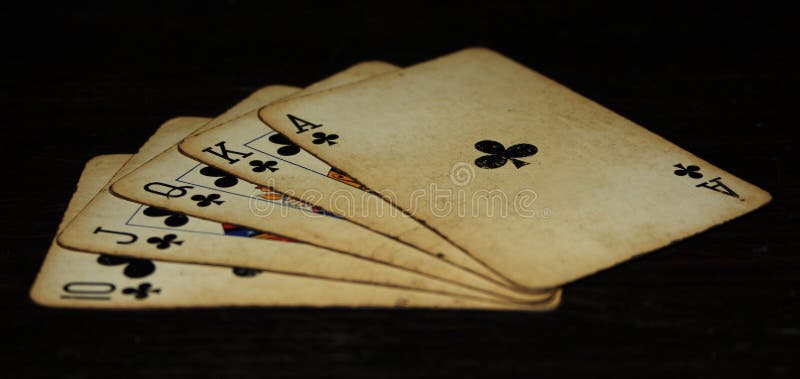 Royal Flush of Clubs on a Black Background Stock Photo - Image of ...