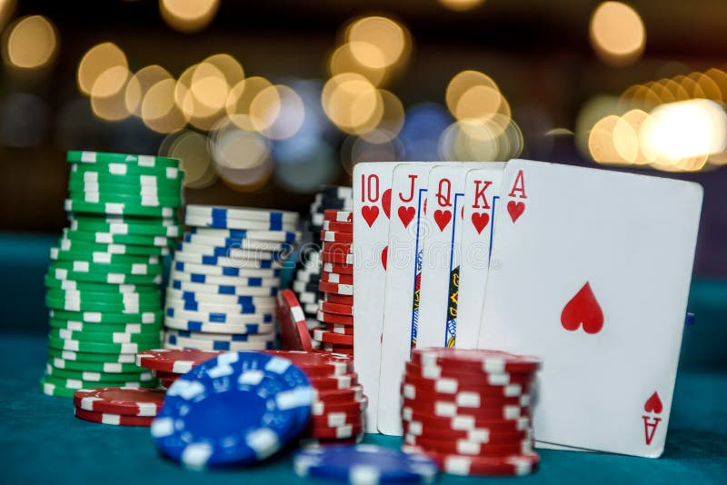 Royal Flush Combination with Poker Chips in Casino Stock Photo - Image