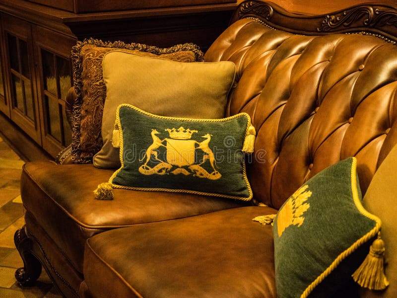 Royal Motif on Pillows with Leather Sofa Stock Photo Image of leather, brown 95412172