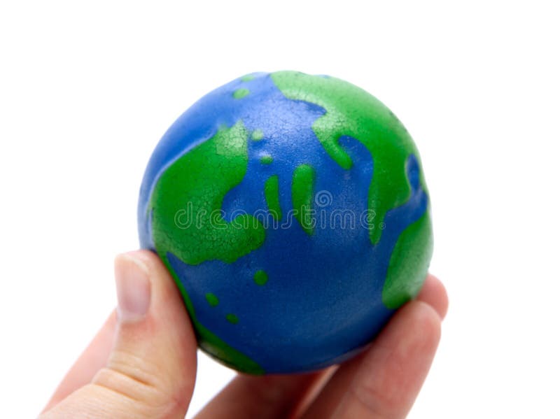 Rubber Ball in the Form of a Globe of the Earth in the Hand of