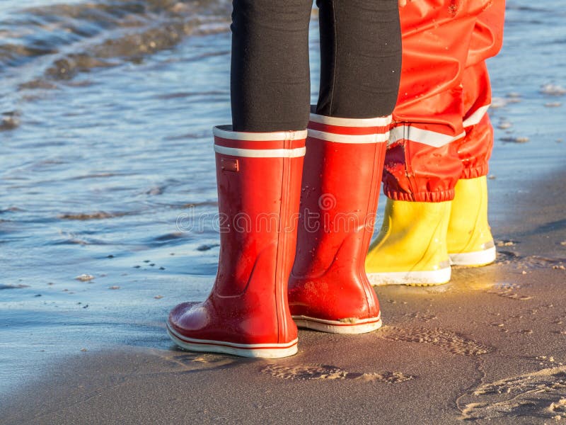 Rubber boots for the beach stock image. Image of beach 193723139
