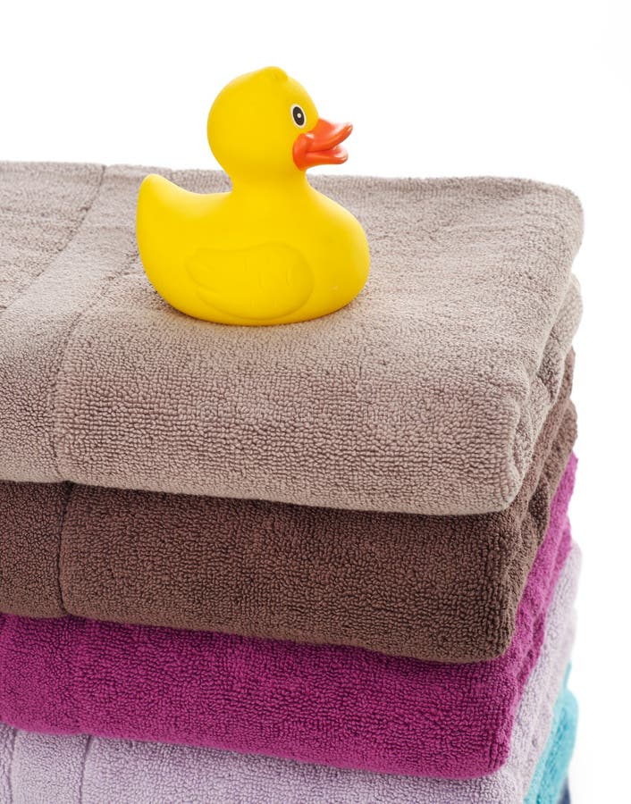 Rubber duck on towels stock image. Image of hygiene, domestic 72484143