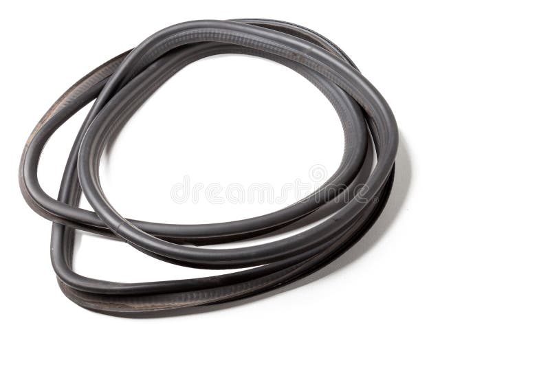 Rubber industrial door seal in a black car on a white background.A synthetic material for maintenance of the technical condition of the machine and parts, replaced during thermal insulation of the air