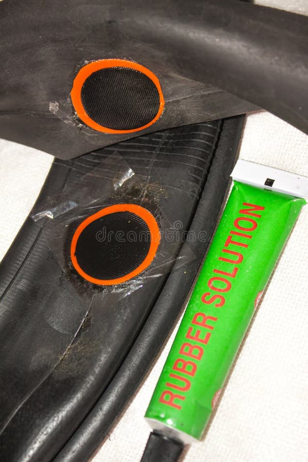 Rubber Patch on the Bicycle Wheel Stock Photo Image of metallic