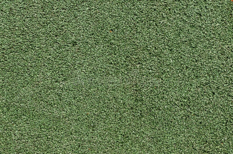 Rubber tile for sidewalks, green. stock photography