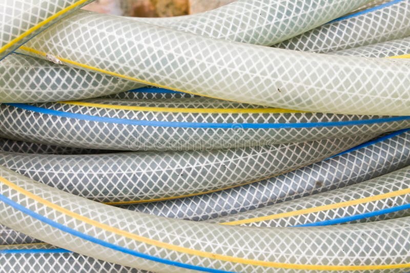 Rubber tube, Watering hose stock photo. Image of plumbing 59511536