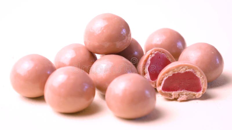 Ruby chocolate close up on white background. stock photos