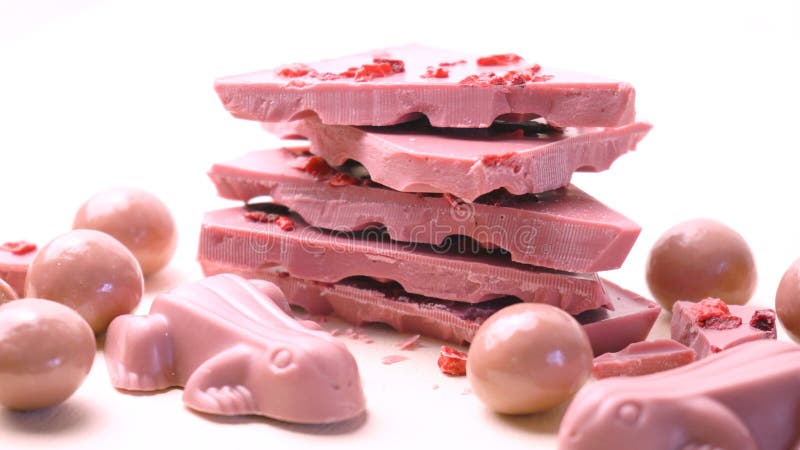 Ruby chocolate close up on white background. royalty free stock images