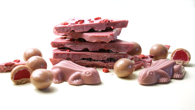 Ruby chocolate macro close up on white background with negative copy space. stock photography