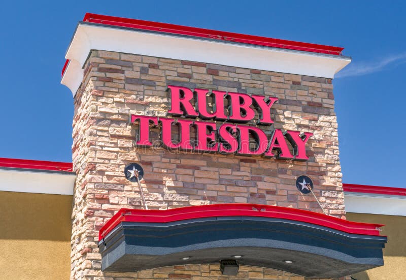 MITCHELL, SD/USA - JUNE 1, 2017: Ruby Tuesday restaurant exterior and sign. Ruby Tuesday Inc. is a chain or restaurants in the United States. MITCHELL, SD/USA - JUNE 1, 2017: Ruby Tuesday restaurant exterior and sign. Ruby Tuesday Inc. is a chain or restaurants in the United States.