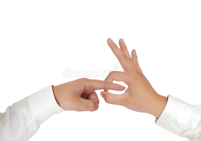 Gesture of hand showing penetrating sex with fingers in formal long sleeved...
