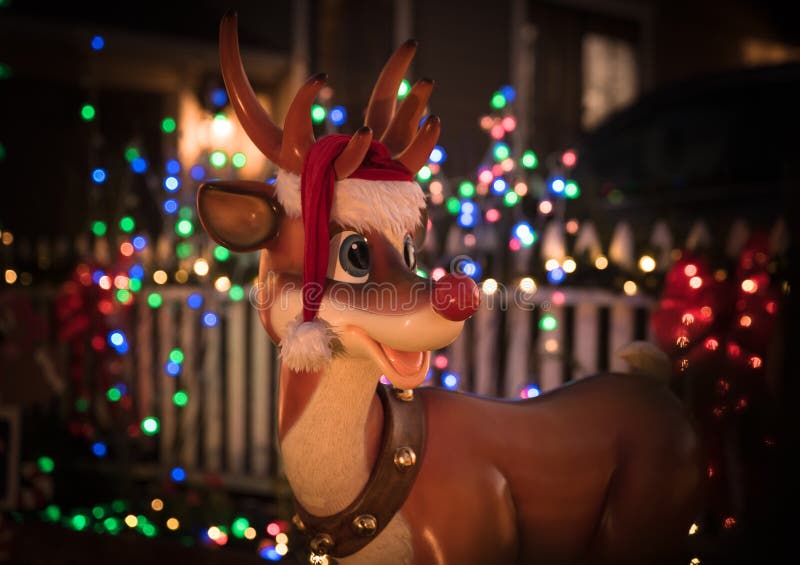 Rudolph il raindeer con bokeh delle luci di Natale