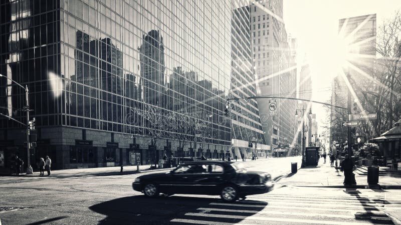 Early morning sunshine on a Manhattan street scene. Early morning sunshine on a Manhattan street scene.