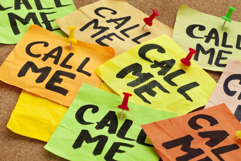 Call me - several sticky notes on cork bulletin board with a reminder. Call me - several sticky notes on cork bulletin board with a reminder