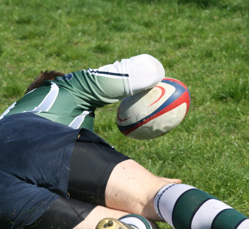 Rugby ball on a tee stock photo. Image of kick, rugby 54040276