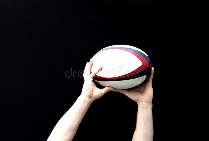 Rugby ball stock image. Image of hands, catch, hold, strength 13286575