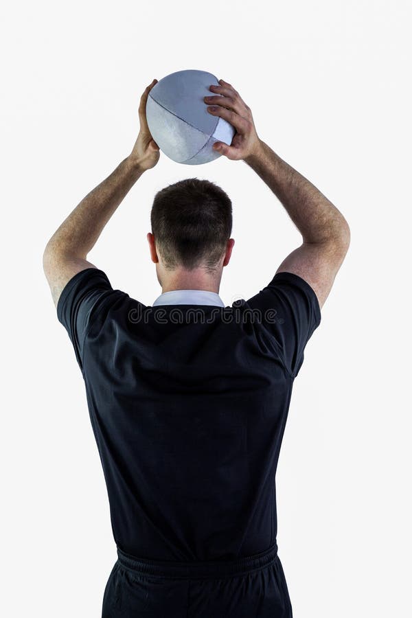 Rugby player about to throw a rugby ball