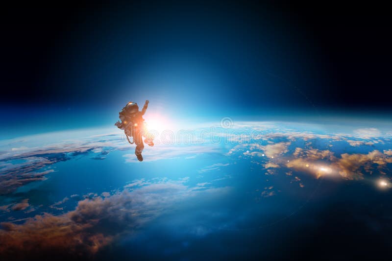 Ruimtevaarder en planeet, menselijk in ruimteconcept stock foto Ruimtevaarder en planeet, menselijk in ruimteconcept stock foto